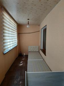 an empty room with two bunk beds in it at Apartment in Tashkent