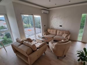 Posezení v ubytování De Lux Apartments Smolovic