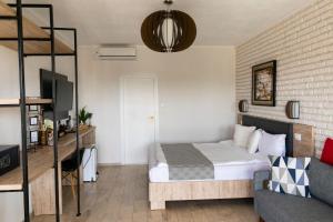 a bedroom with a bed and a bunk bed at Boutique 23 in Douăzeci şi Trei August
