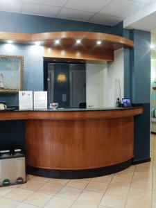 a lobby with a reception desk in a hospital at La Camogliese Hotel B&B in Camogli