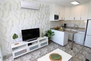 Kuchyň nebo kuchyňský kout v ubytování Apartments ALOE TOP FLOOR + 15 fotografií
