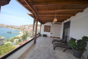 Balkón nebo terasa v ubytování Luxury Penthouse B&E