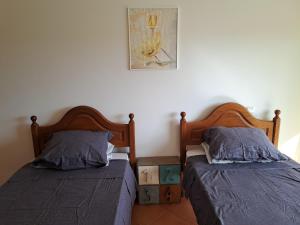 Кровать или кровати в номере Lark View