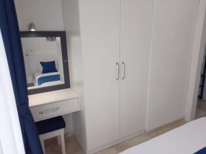 A bed or beds in a room at Stone House Aparts 1 plus 1 mit Poolterrasse Kalkan No 1