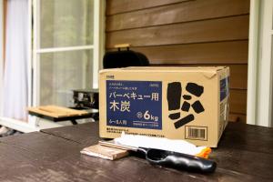 Fotografie z fotogalerie ubytování 鳥の街77号北軽井沢#木の香りに包まれる癒しの木House#吹き抜けのある貸切別荘#BBQ#ダーツ#カラOK#大画面プロジェクター#駐車可 v destinaci Cumagoi