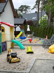 a playground with many different types of play equipment at Zatoczka Turawa in Turawa