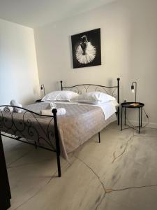 Postel nebo postele na pokoji v ubytování Apartments Alać