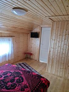 Postel nebo postele na pokoji v ubytování Casa Faurului + 37 fotografií