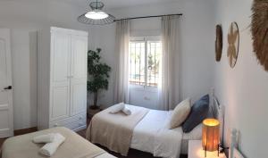 Posteľ alebo postele v izbe v ubytovaní Casa Rural Villa Arylex