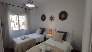 Posteľ alebo postele v izbe v ubytovaní Casa Rural Villa Arylex