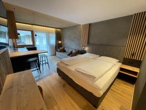 Posteľ alebo postele v izbe v ubytovaní Residence Tantalus