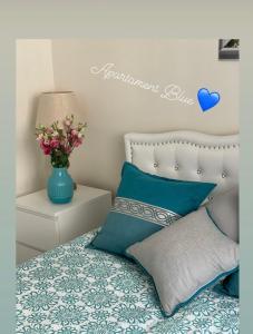 Posteľ alebo postele v izbe v ubytovaní Apartament Jantarowe Zacisze Blue