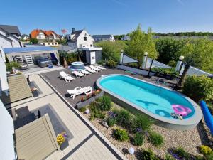 an overhead view of a swimming pool on top of a house at Apartamenty Polanki 2 in Łeba