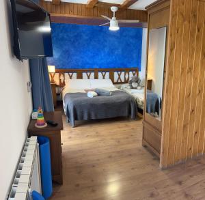 A bed or beds in a room at Apartaments Arenys De Boi