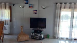 TV a/nebo společenská místnost v ubytování Villa MARGIANI