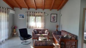 Posezení v ubytování Villa MARGIANI