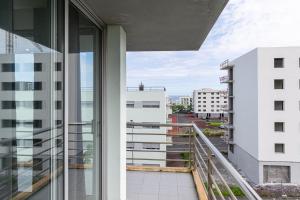 a view from the balcony of a building at Atlantic West Town in Ponta Delgada