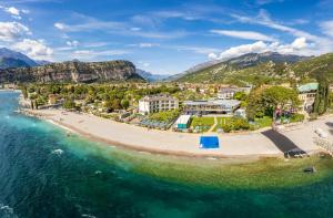 an aerial view of a beach in the water at Residence Casa al Sole Apartments in Nago-Torbole