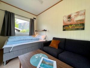 Postel nebo postele na pokoji v ubytování Trollstigen Resort