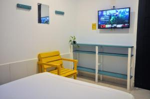 TV a/nebo společenská místnost v ubytování Bona Vida Apartments + 24 fotografií