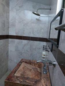 Ванна кімната в Casa El Vergel