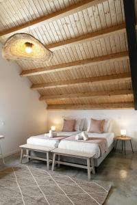 Ένα ή περισσότερα κρεβάτια σε δωμάτιο στο Villa Arneiro 1