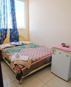 Ένα ή περισσότερα κρεβάτια σε δωμάτιο στο Santa Cruz Departamentos 2