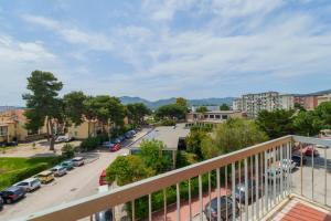 a view of a city street from a balcony at Angela Suite in Portoferraio
