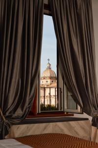 Postel nebo postele na pokoji v ubytování Hotel Roma Vaticano