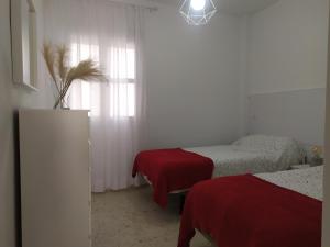 Posteľ alebo postele v izbe v ubytovaní Casa Julia