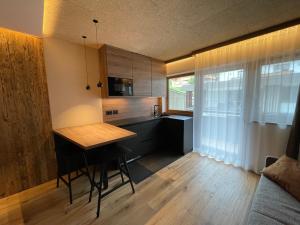 Kuchyňa alebo kuchynka v ubytovaní Residence Tantalus