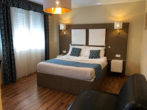 Postel nebo postele na pokoji v ubytování chambre suite B&B