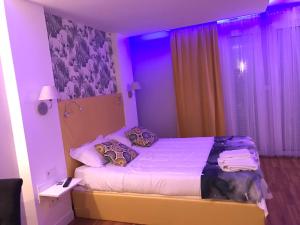 Postel nebo postele na pokoji v ubytování chambre suite B&B