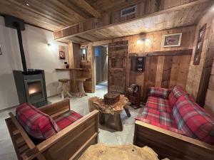 Posezení v ubytování HIBOU Chambres - Cogne