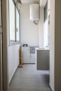 Kuchyň nebo kuchyňský kout v ubytování Vita Home