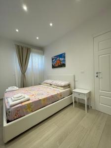 Letto o letti in una camera di B&B San Luca