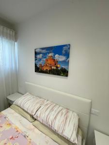 Letto o letti in una camera di B&B San Luca