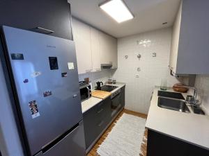 Kuchnia lub aneks kuchenny w obiekcie Maravilloso Ático-duplex