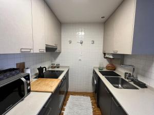 Kuchnia lub aneks kuchenny w obiekcie Maravilloso Ático-duplex