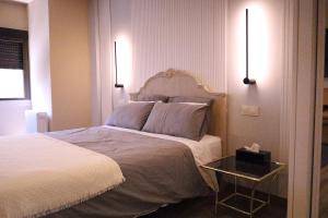 Postel nebo postele na pokoji v ubytování GOYA Loft de Categoría Nuevo