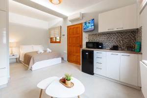 Kuchyň nebo kuchyňský kout v ubytování Aroma Accommodations + 18 fotografií
