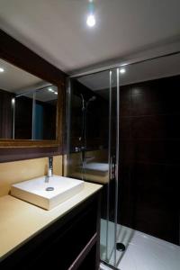 a bathroom with a sink and a shower at 06A4 - Situation exceptionnelle au Port de Nice in Nice