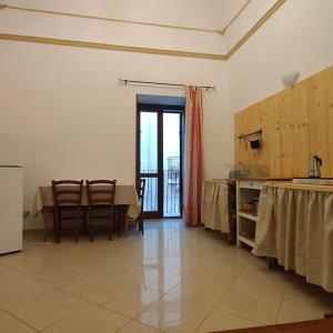 Kuchyň nebo kuchyňský kout v ubytování Appartamento Corso Savoia