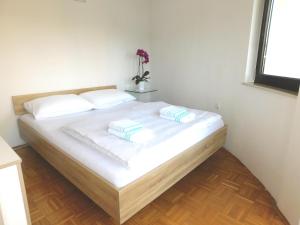 Ένα ή περισσότερα κρεβάτια σε δωμάτιο στο Apartment Mateo