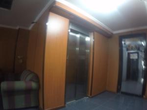a room with a door open and a door open at Hotel Villa del Mar in Panama City