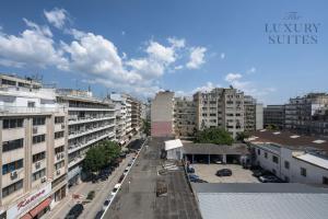 an aerial view of a city with tall buildings at Nephele, The Luxury Suites in Thessaloniki