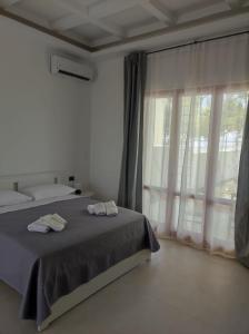 Postel nebo postele na pokoji v ubytování Villa Rita Apartament & Rooms + 36 fotografií