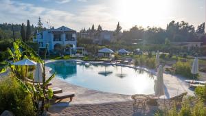 The swimming pool at or close to Sun 'n Chill, Boutique Apartments & Beach Villa