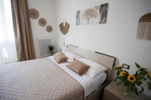Postel nebo postele na pokoji v ubytování Appartamento Torregalli, confortevole e moderno