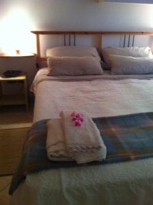Een bed of bedden in een kamer bij B&B Il Portico del Conte